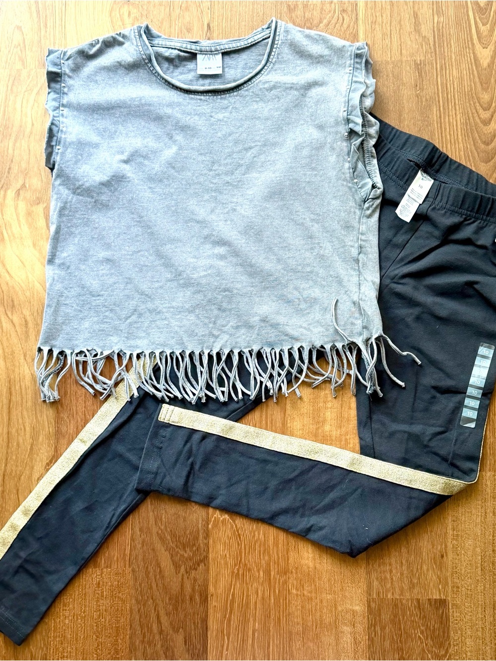 Zara Gray Fringe Tee with Black Leggings and Gold Side Stripe